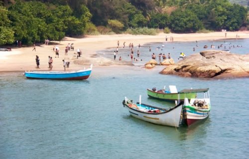 Colored wooden boats on the Om beach in Gokarna. Karnataka, India